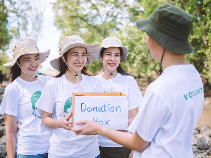 group-of-asian-diverse-people-volunteer-holding-a-donation-box-for-world-environment-day-campaign-.jpg